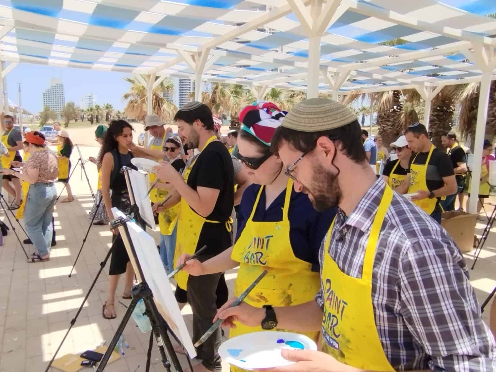 Creativity and community at Efrat Development Foundation's outdoor paint and art event.
